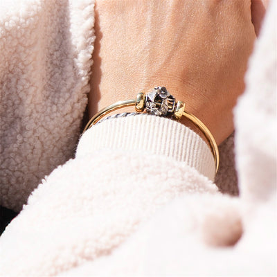 Skleiskis!, sidabrinis karoliukas