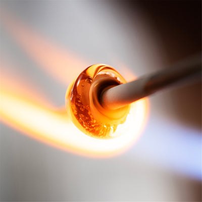 Austa šviesa, stiklo karoliukas