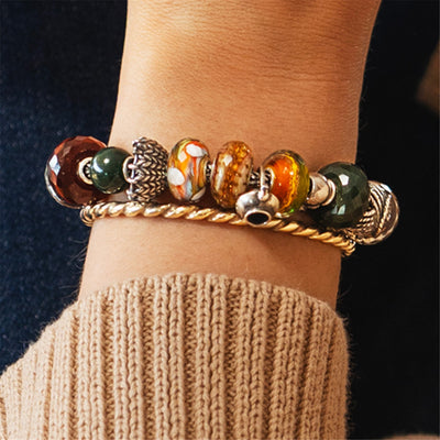 Austa šviesa, stiklo karoliukas