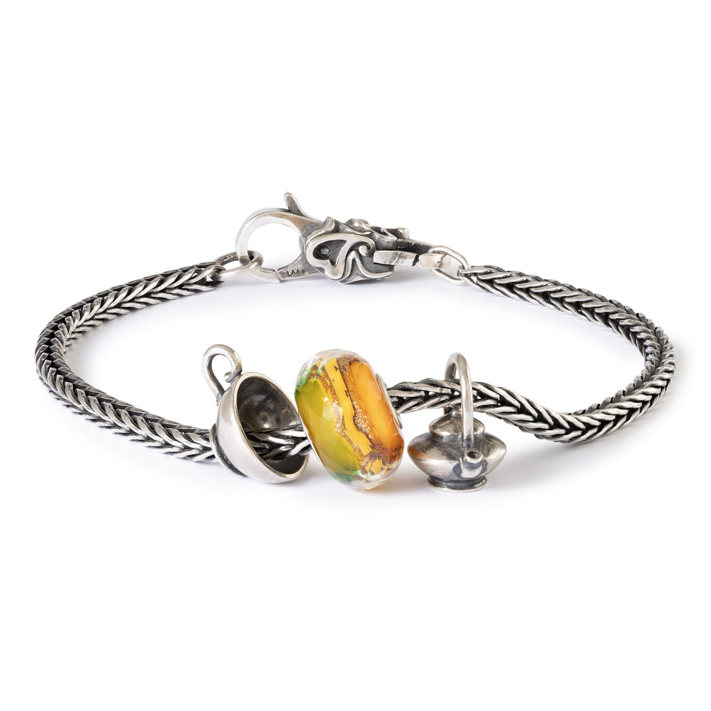 Laikas arbatai!, sidabrinis karoliukas