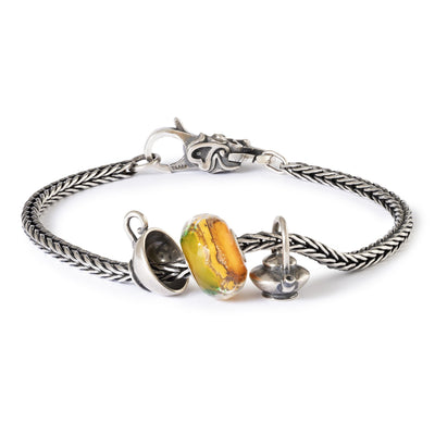 Laikas arbatai!, sidabrinis karoliukas