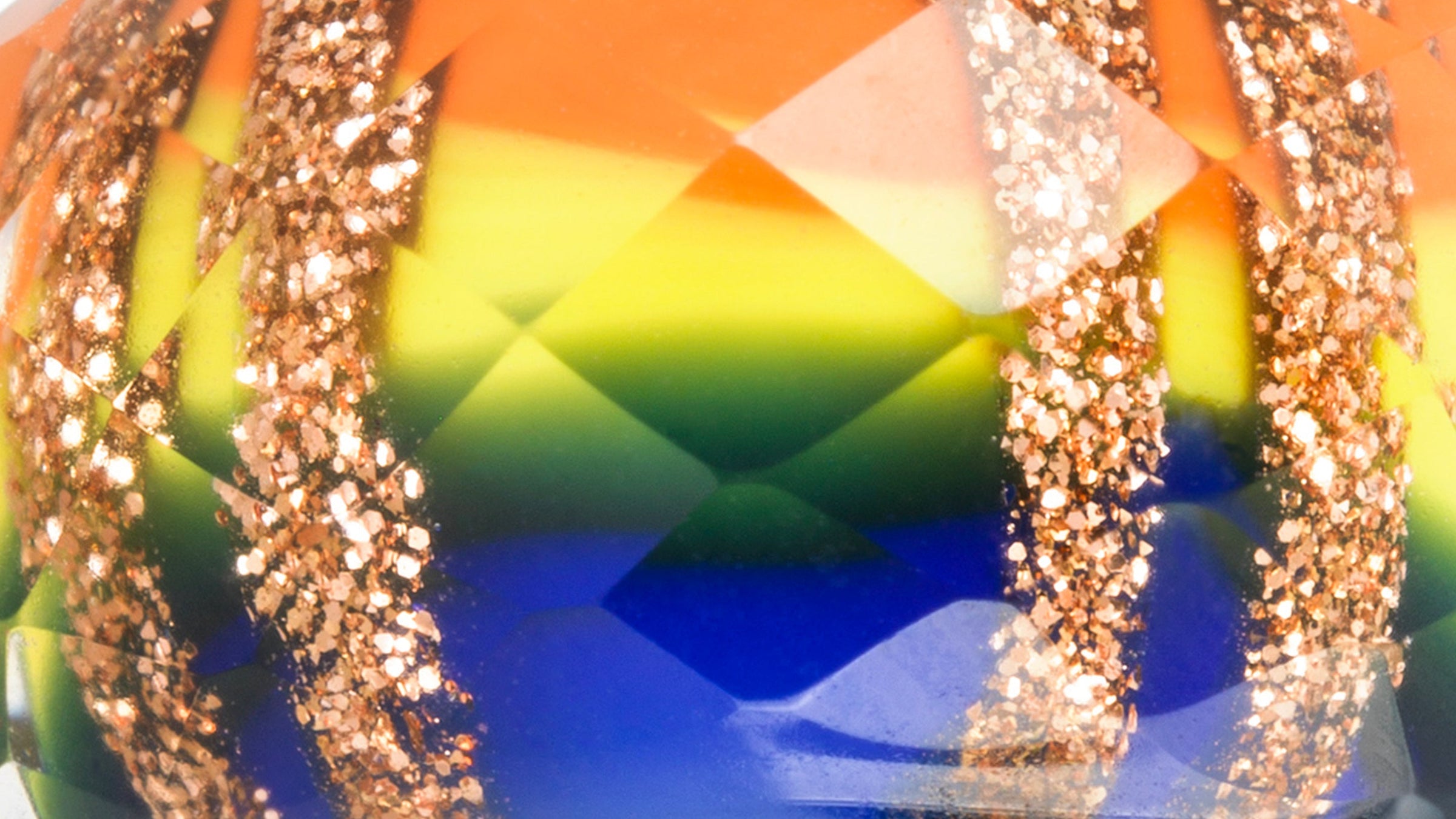 Close up of Rainbow Facet glass uniques bead Peoples Uniques winner 2023