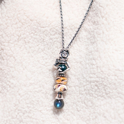 Švytinti energija, stiklo karoliukas